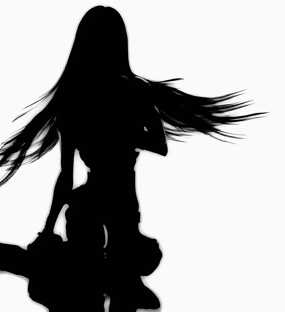 Silhouette of a woman with long hair whipping to one side